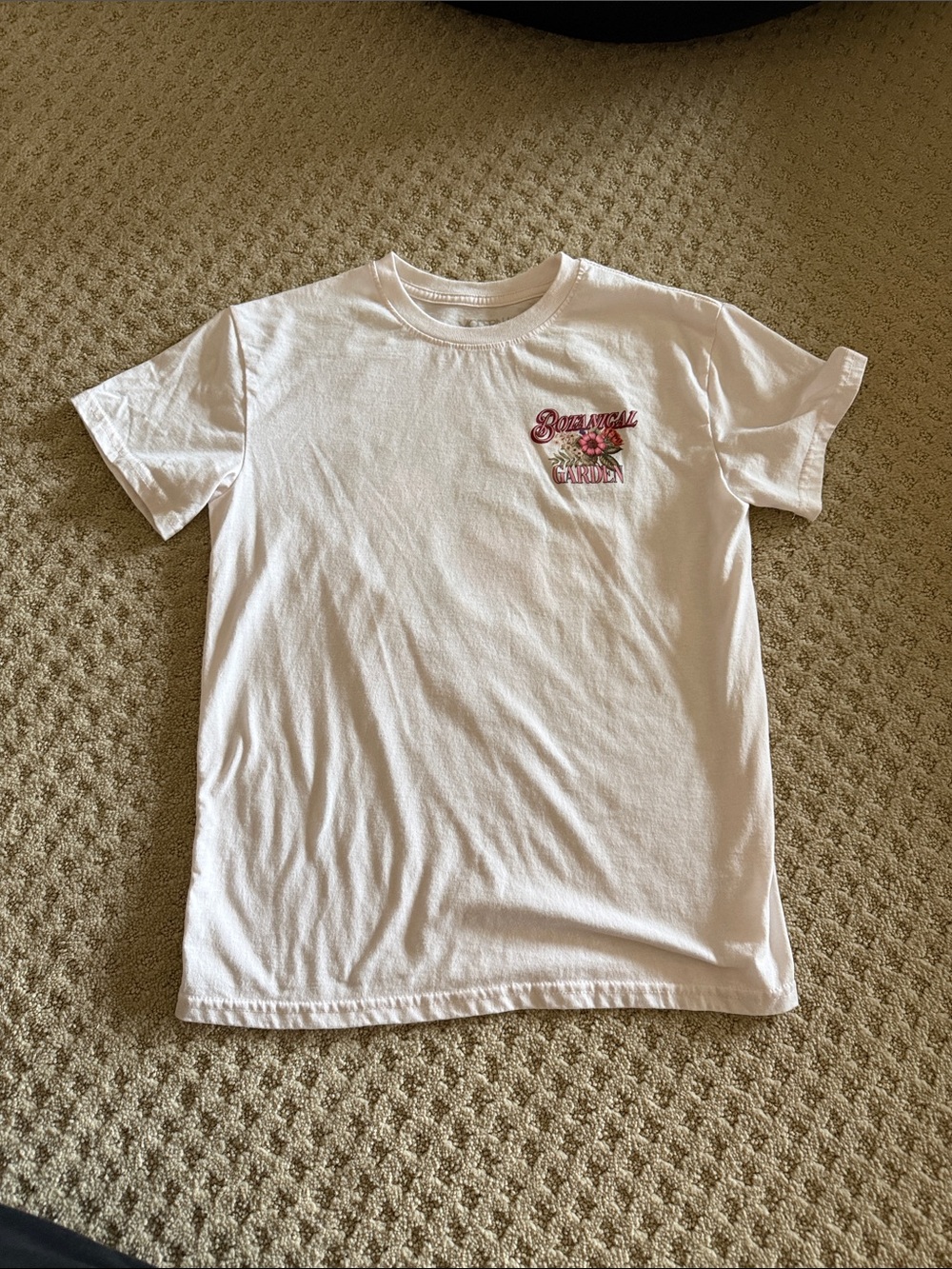 Beige Short‑Sleeve Graphic Tee with Pink Chest Detail